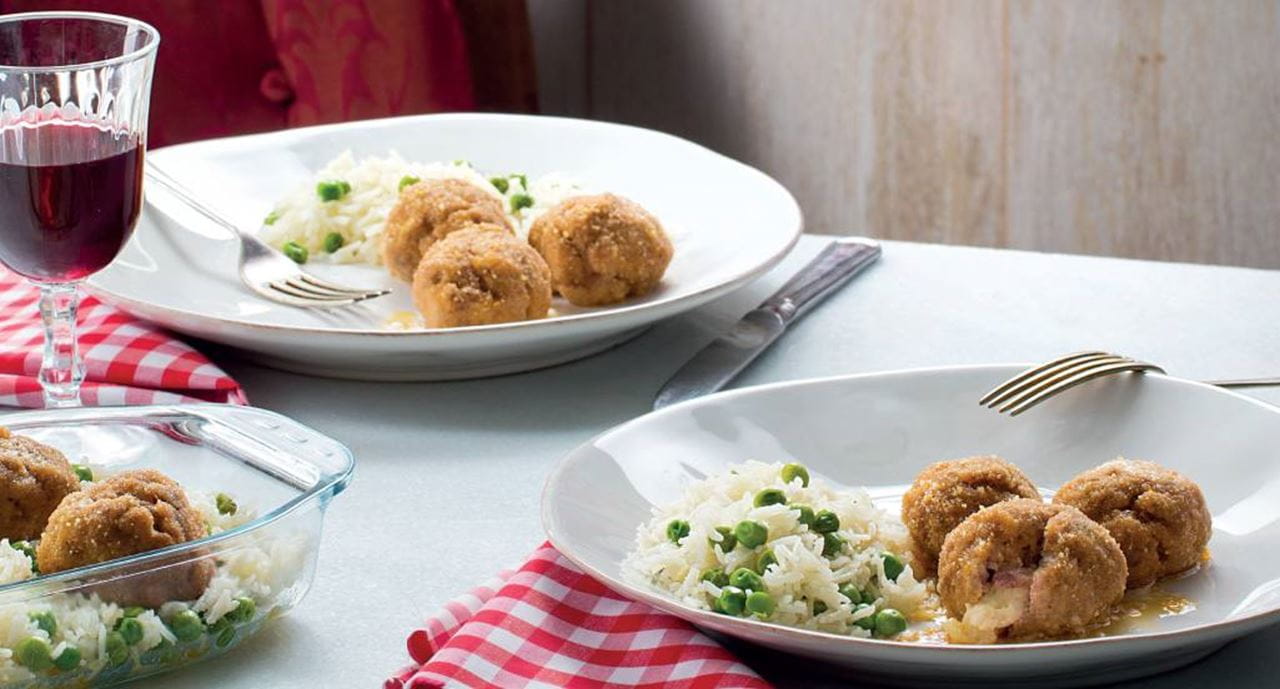 recipe image Almôndegas Recheadas e Arroz Seco de Ervilhas no  Forno