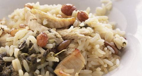 recipe image Arroz de forno com recheio de peru, espinafres, pinhões e passas